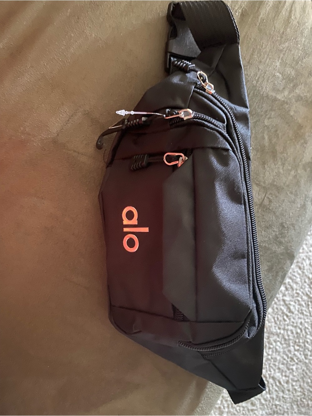 ALO Yoga Black Sling Belt Bag with Pink Logo